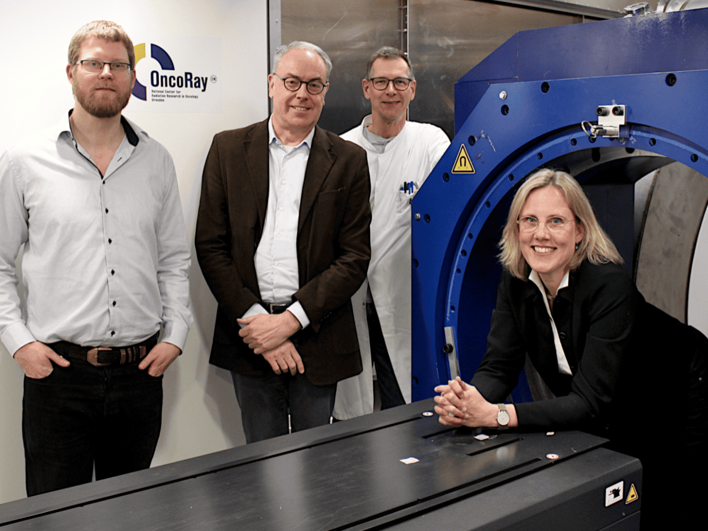 They are using this device to research the cancer medicine of tomorrow: The MEDABIS-PRO team at the OncoRay in-beam MRI prototype (from left): Dr. Felix Horst, Prof. Aswin Hoffmann, PD Dr. Jörg Pawelke and Prof. Esther Troost.