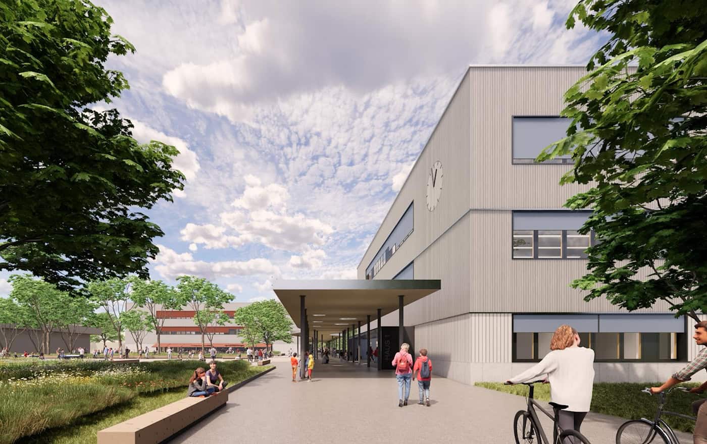 Main building and entrance of the new Bertolt Brecht High School in Dresden A modern, bright facade of a three-story school building with a large station clock. In front of the entrance is a long canopy. Students are moving around the forecourt, some on bicycles, and to the left, a green space invites visitors to linger.