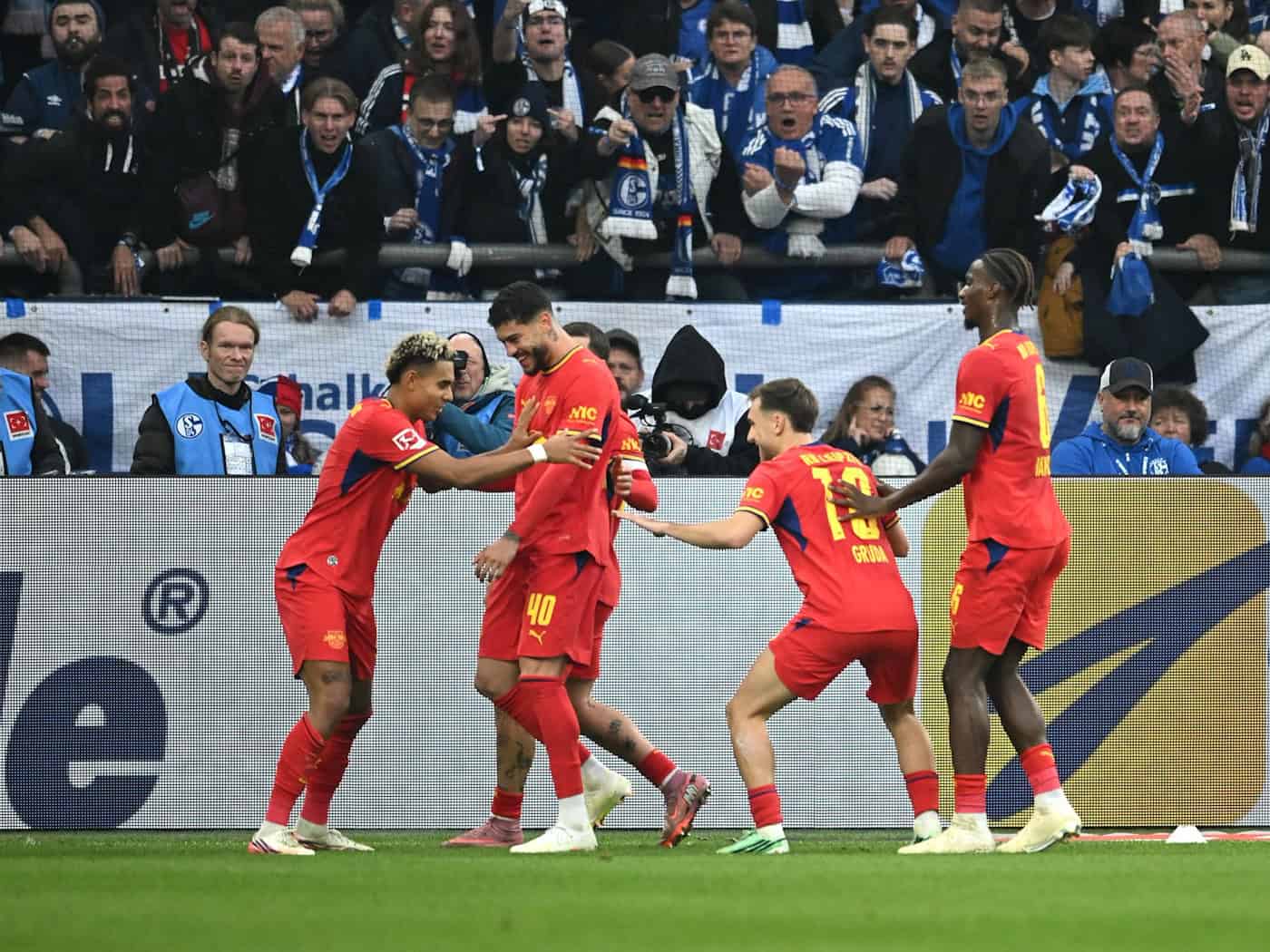 Leipzig's first road win adds to Schalke's woes