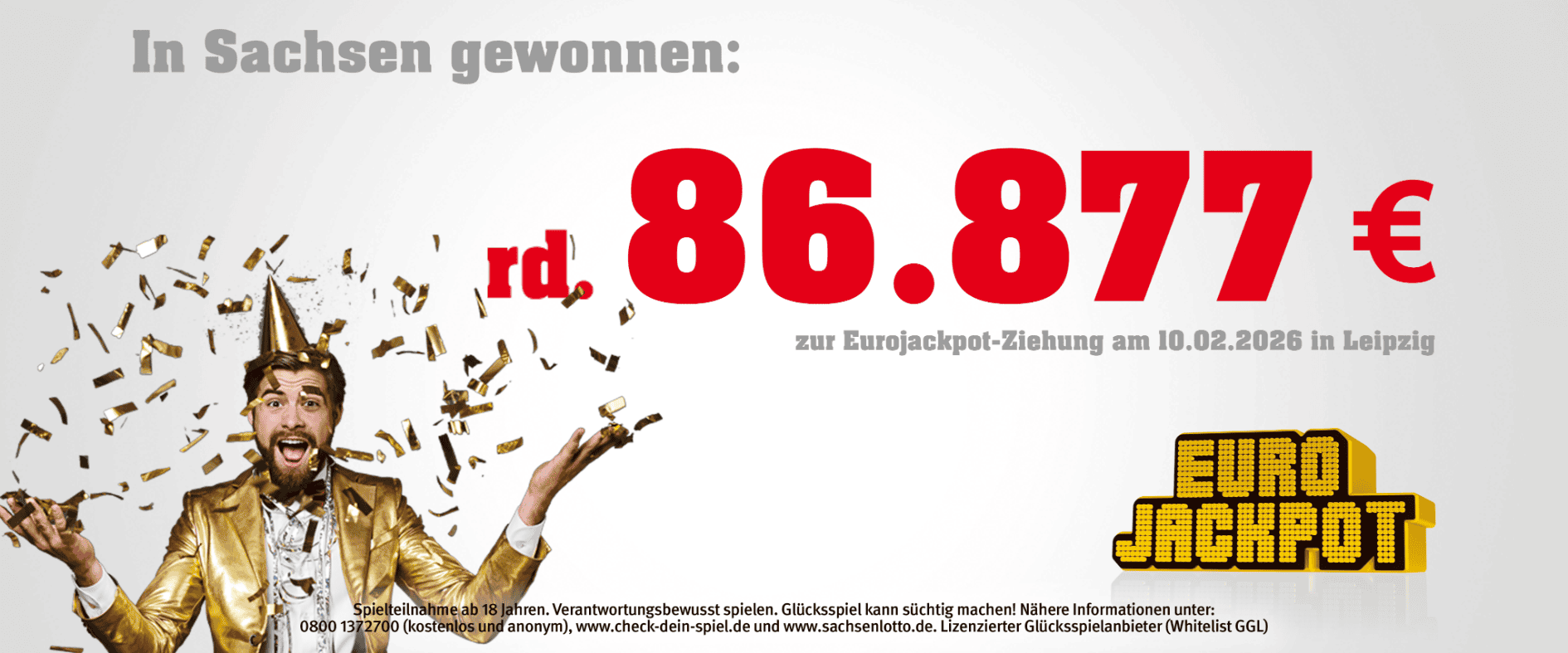 Eurojackpot Leipzig: Mann im goldenen Anzug mit Konfetti vor Schriftzug „86.877 Euro gewonnen zur Eurojackpot-Ziehung am 10.02.2026 in Leipzig“.