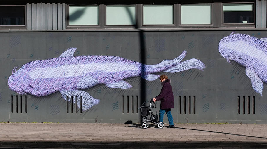 Großflächige Graffiti an Supermarktwand
